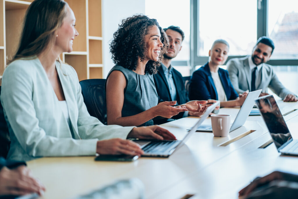 Business persons on meeting in the office. Group of business persons in business meeting. Group of entrepreneurs on meeting in board room. Corporate business team on meeting in the office.